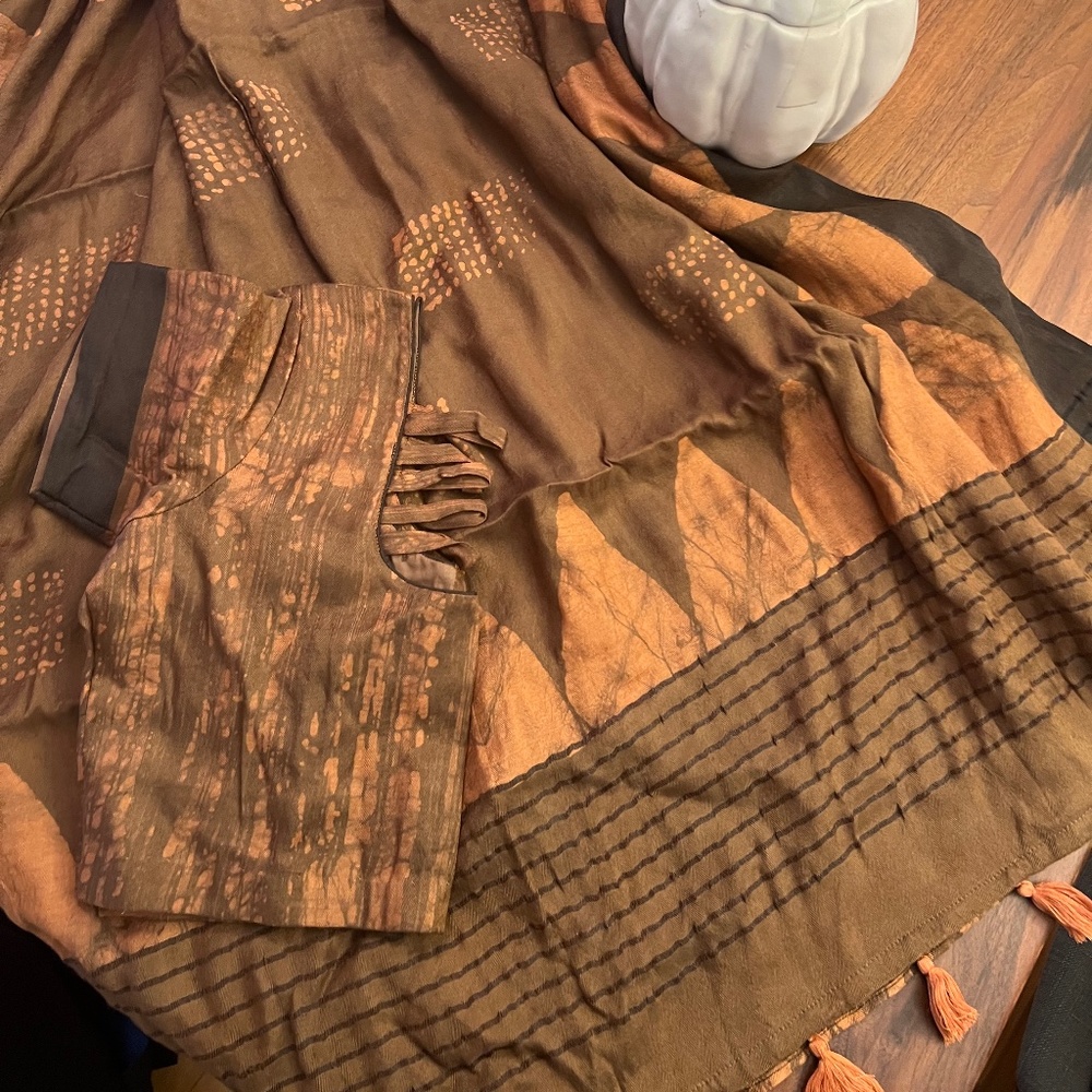 Saree with blouse.